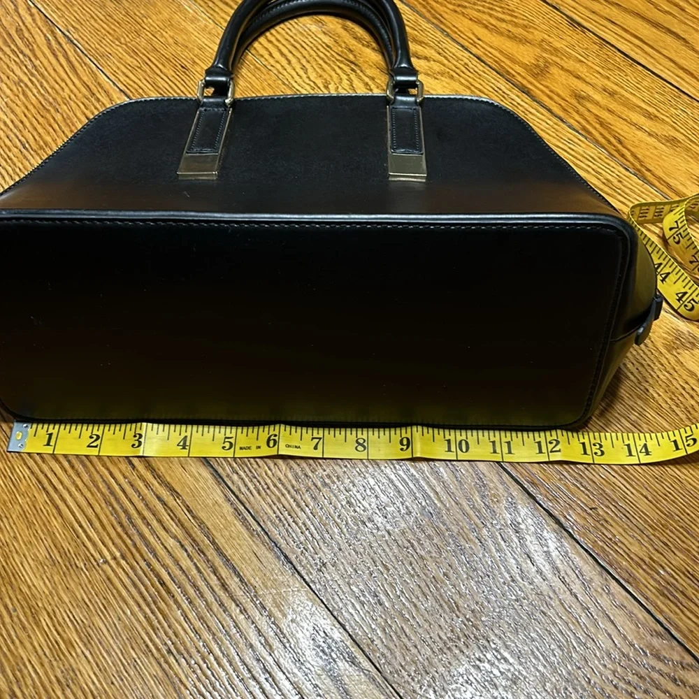 Aldo Faux leather handbag. Shoulder strap missing. Good condition. Black.